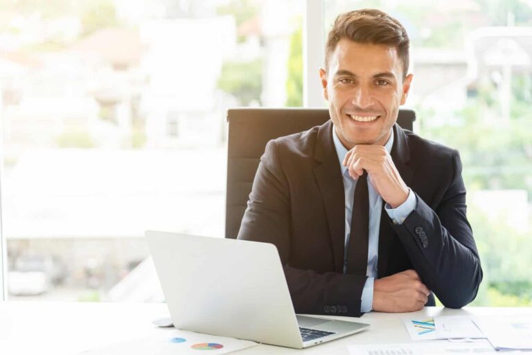 portrait-of-handsome-businessman-sitting-with-smile-in-office-administrator-executive-manager-or-boss_t20_jod8px